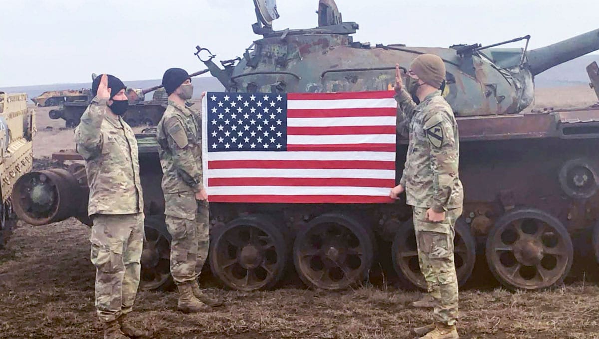 A Co, 2-5 Cavalry Saluting American Flag 